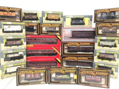 A Collection Of 00 Gauge Wagons And Coaches. By Hornby. Wrenn And Mainline.