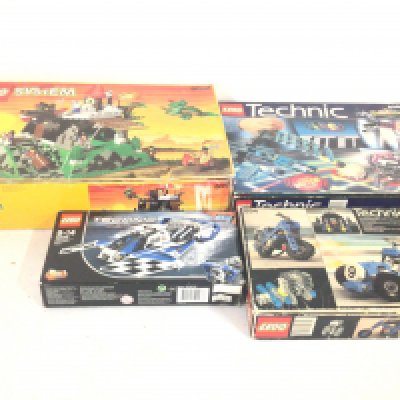 A collection of four boxed previously owned Lego sets featuring 6082..Â¦8266.  Â¦854. Â¦42045..possible incomplete viewing recommended.  No reserve
