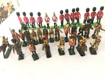 A Small Collection Of Plastic And Repainted Led Britains Soldiers.