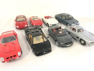 8 x 1:18 scale die cast cars including Jaguar and Mercedes etc.
