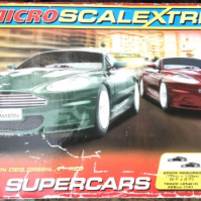 A Collection Of Loose Scalextric And A Micro Scalextric DBS Supercars. (2) No Reserve.