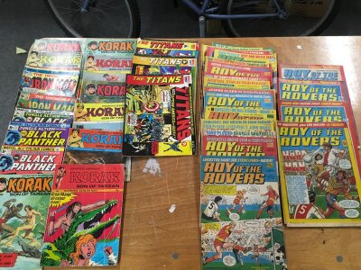 An assorted collection of comics including Iron man and Roy of the Rover