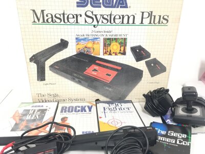 A Boxed Sega Master System Puss Games And Extras.