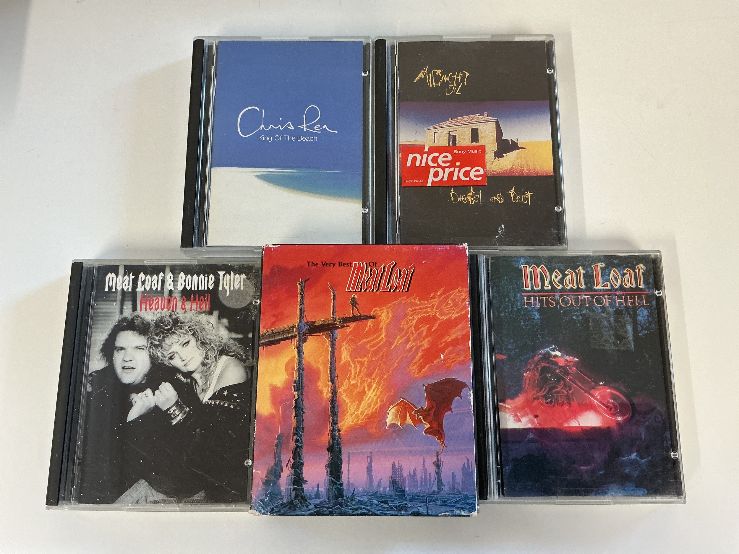 Five minidiscs by various artists including Meat Loaf, Chris Rea and Midnight Oil.