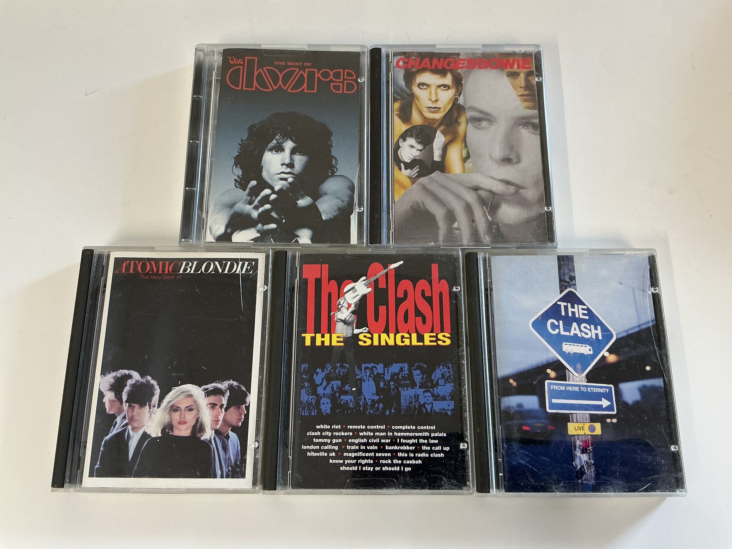 Five minidiscs by various artists comprising David Bowie, The Doors, The Clash and Blondie.