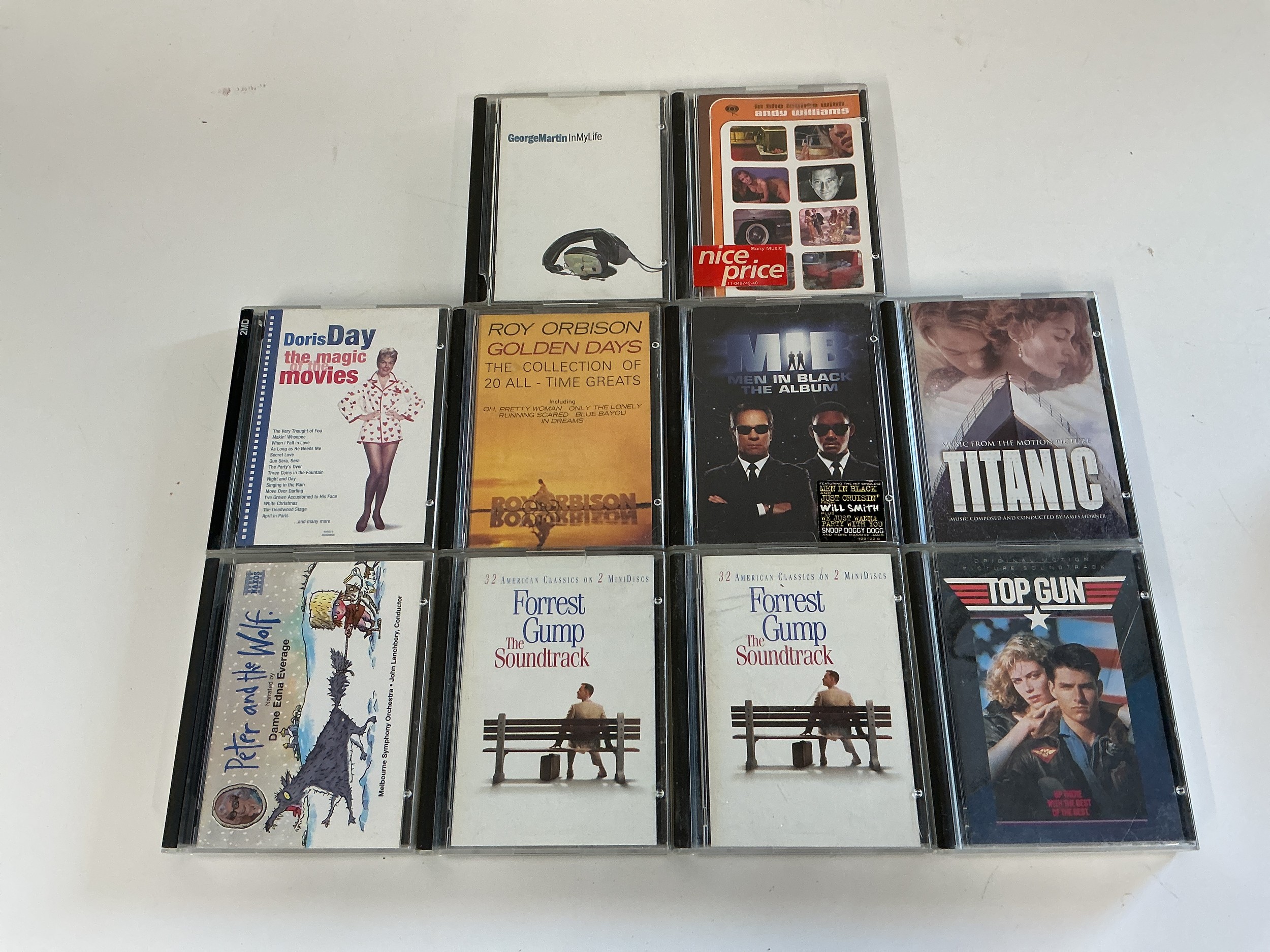 Ten minidiscs comprising film soundtracks and compilations including Top Gun, Men In Black, Titanic and others.