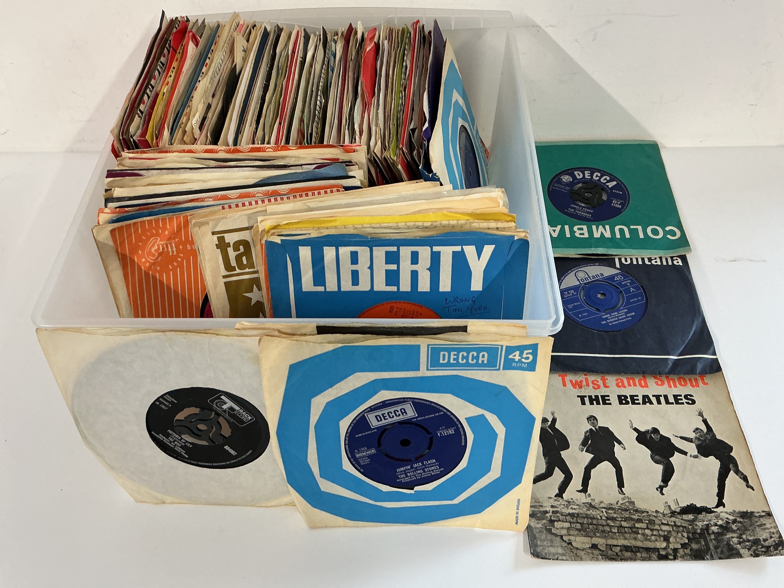 A collection of 7" singles, EPs and LPs by various artists including The Beatles, The Rolling Stones, The Who and many more.