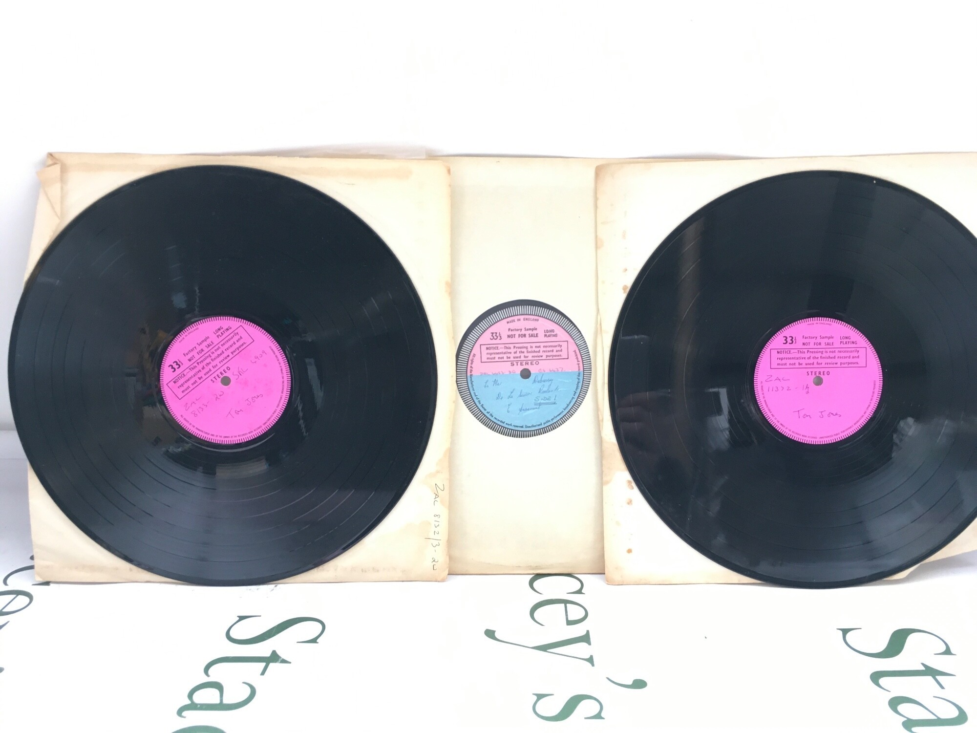 Two Tom Jones factory sample 12" discs plus a Debussy factory sample record (3).