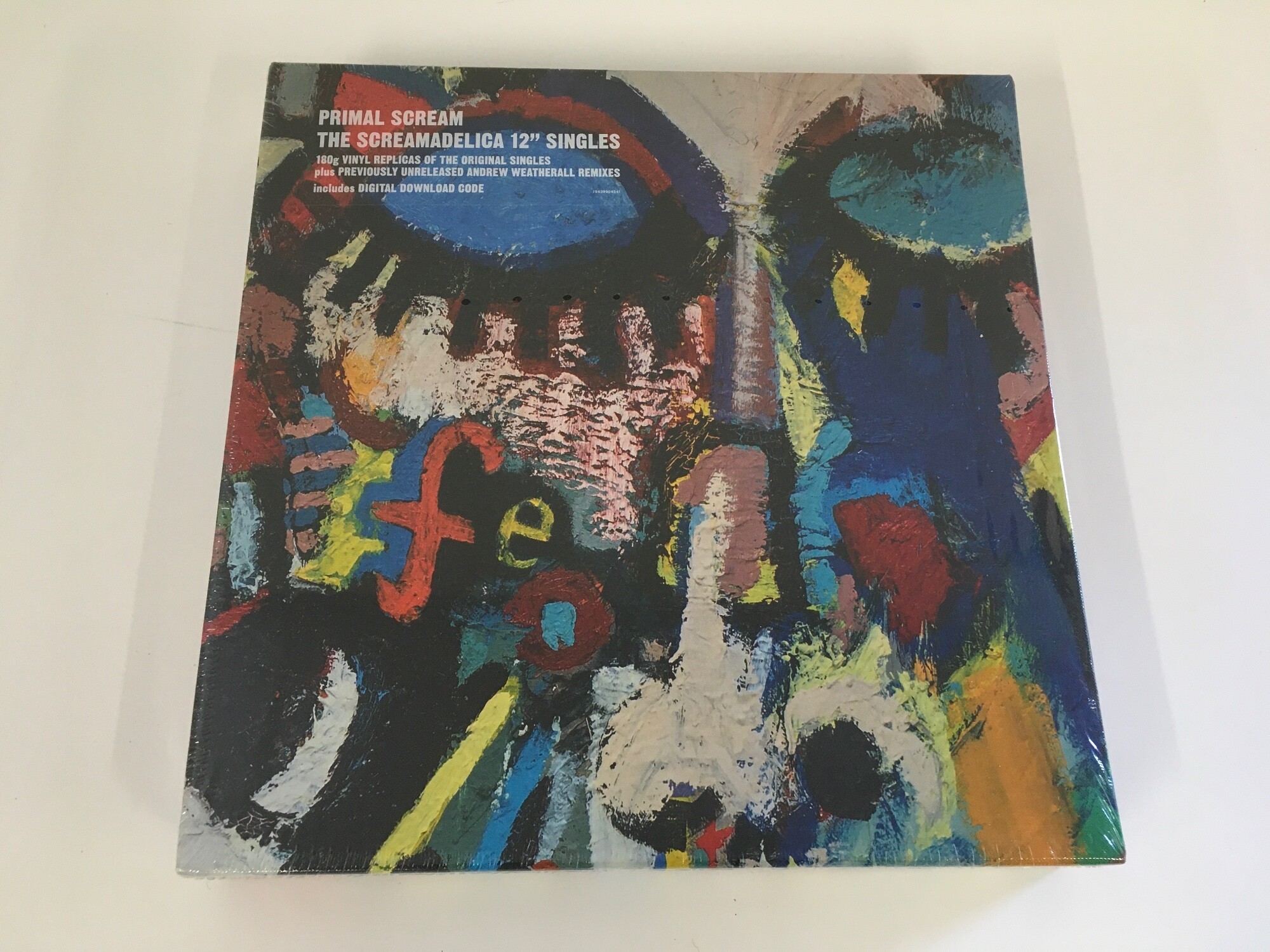 A sealed Primal Scream - Screamadelica 12" singles box set on 180g vinyl.