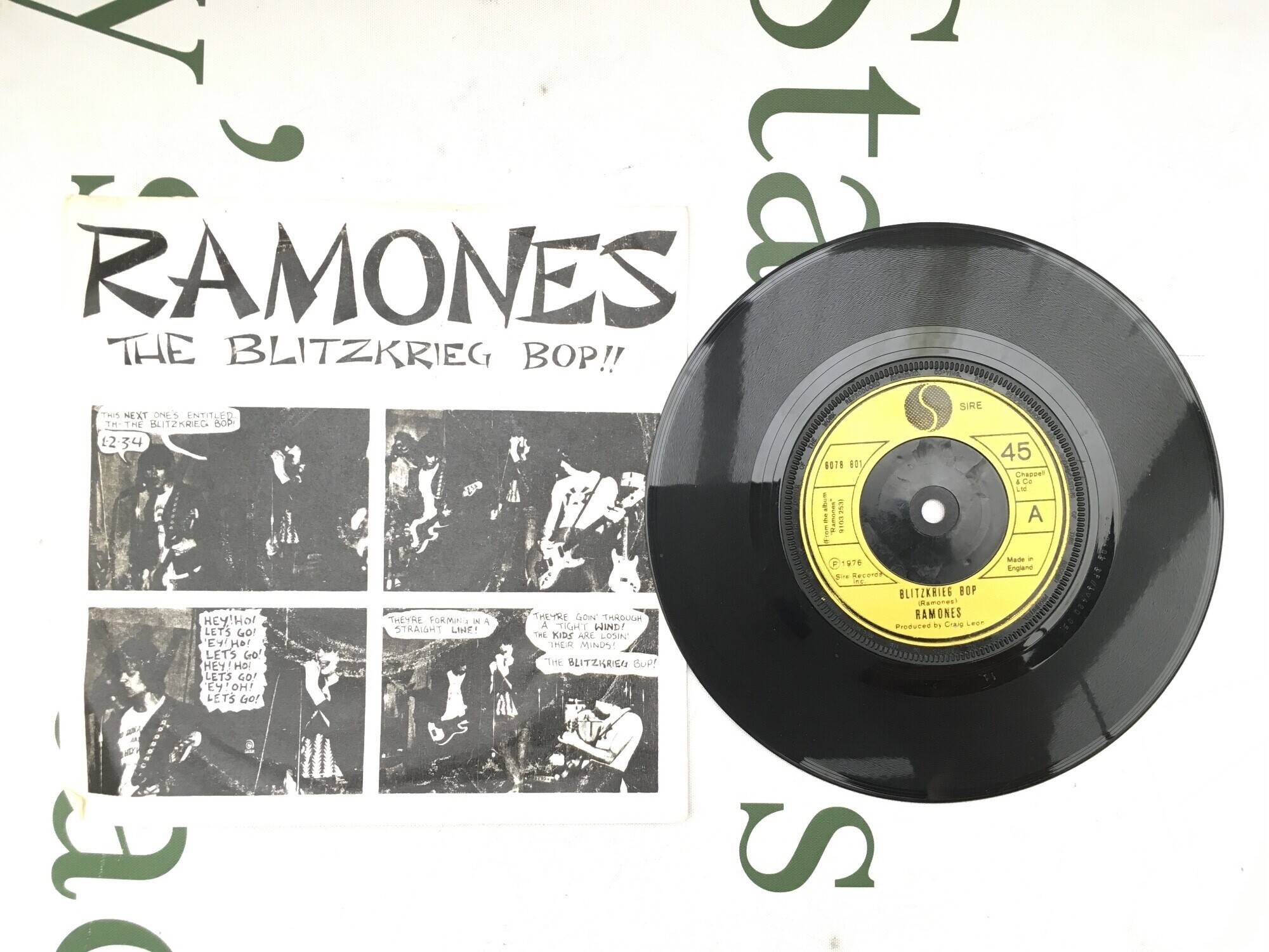 A first UK pressing of The Ramones - Blitzkrieg Bop 7" single in a picture sleeve (sleeve not original) . Vinyl EX.