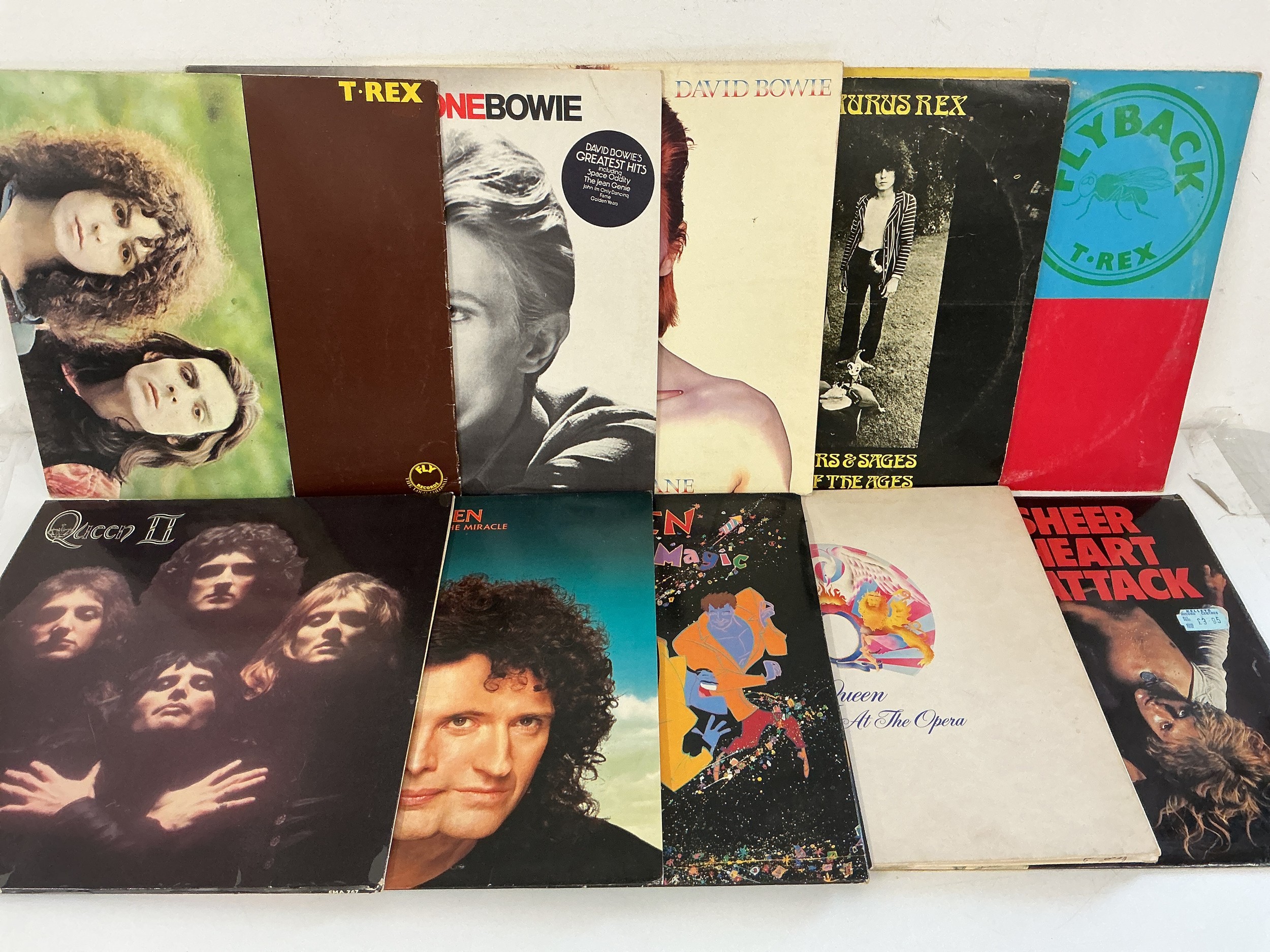 Ten rock LPs by Queen, David Bowie and T Rex including Aladdin Sane, Queen II, A Night At The Opera and others.