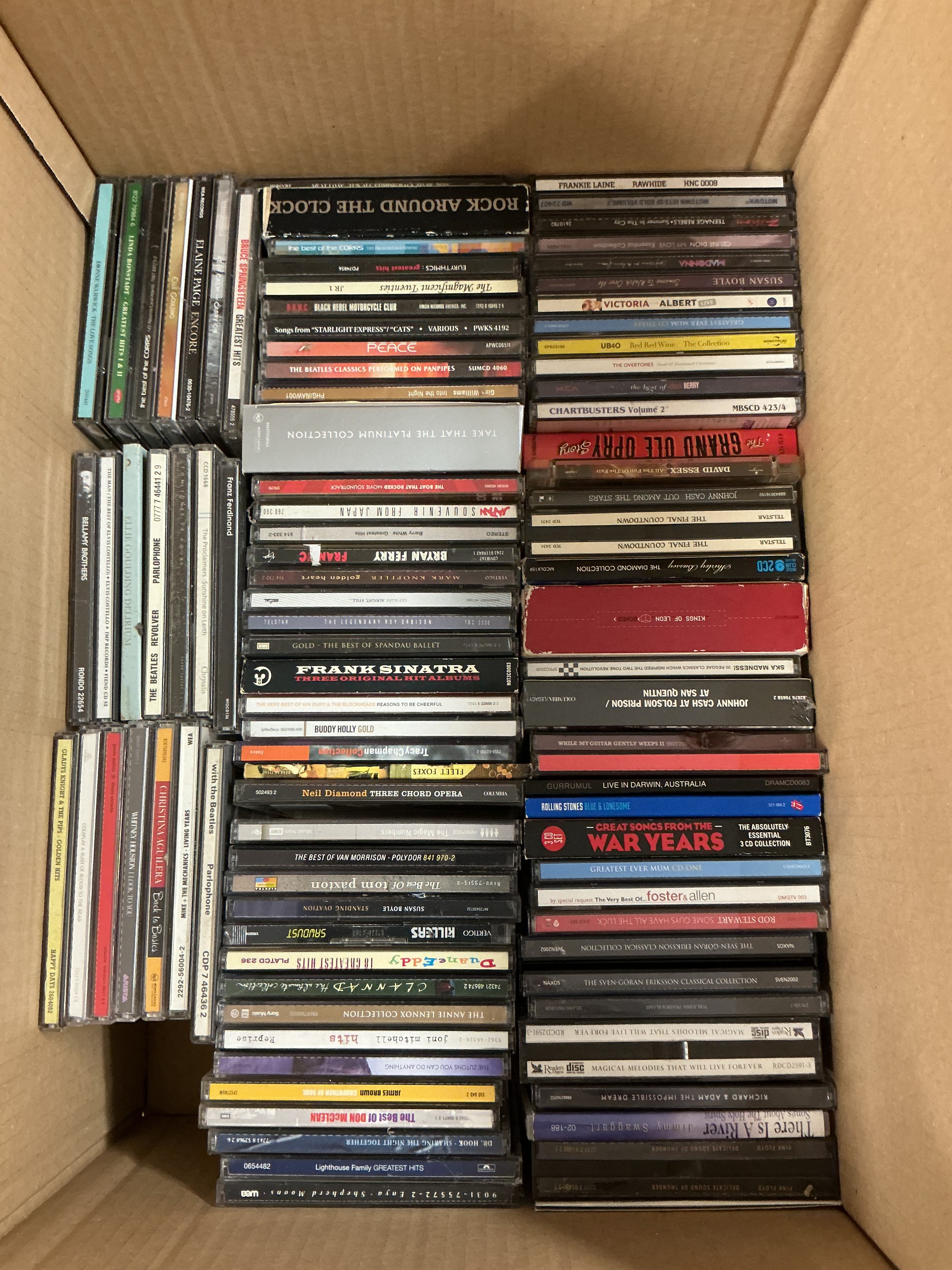 Four boxes of CDs, DVDs and BluRays.