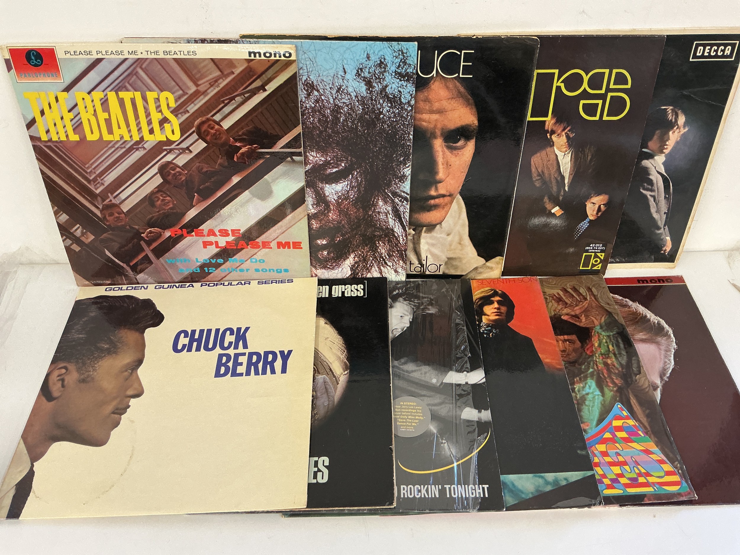 A record case of 60s rock and pop LPs, EPs and 7" singles by various artists including The Beatles, Jimi Hendrix, The Doors and others.