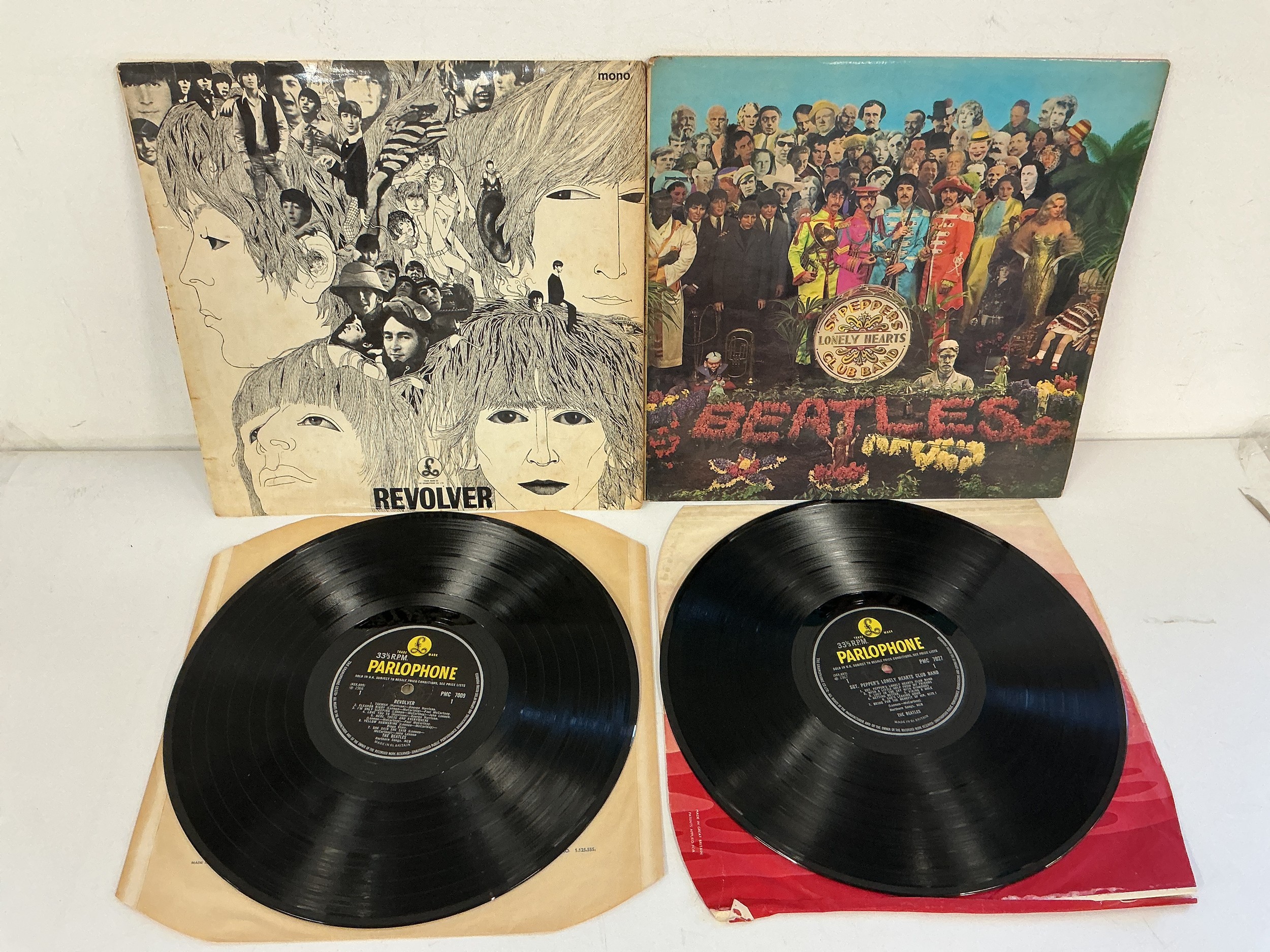 Two Beatles LPs comprising a first UK mono pressing of Revolver with the withdrawn mix of Tomorrow Never Knows on Side B, YEX 605-2 and 606-1. Also includes an early mono pressing of Sgt Peppers with insert and original inner sleeve. Both VG+.