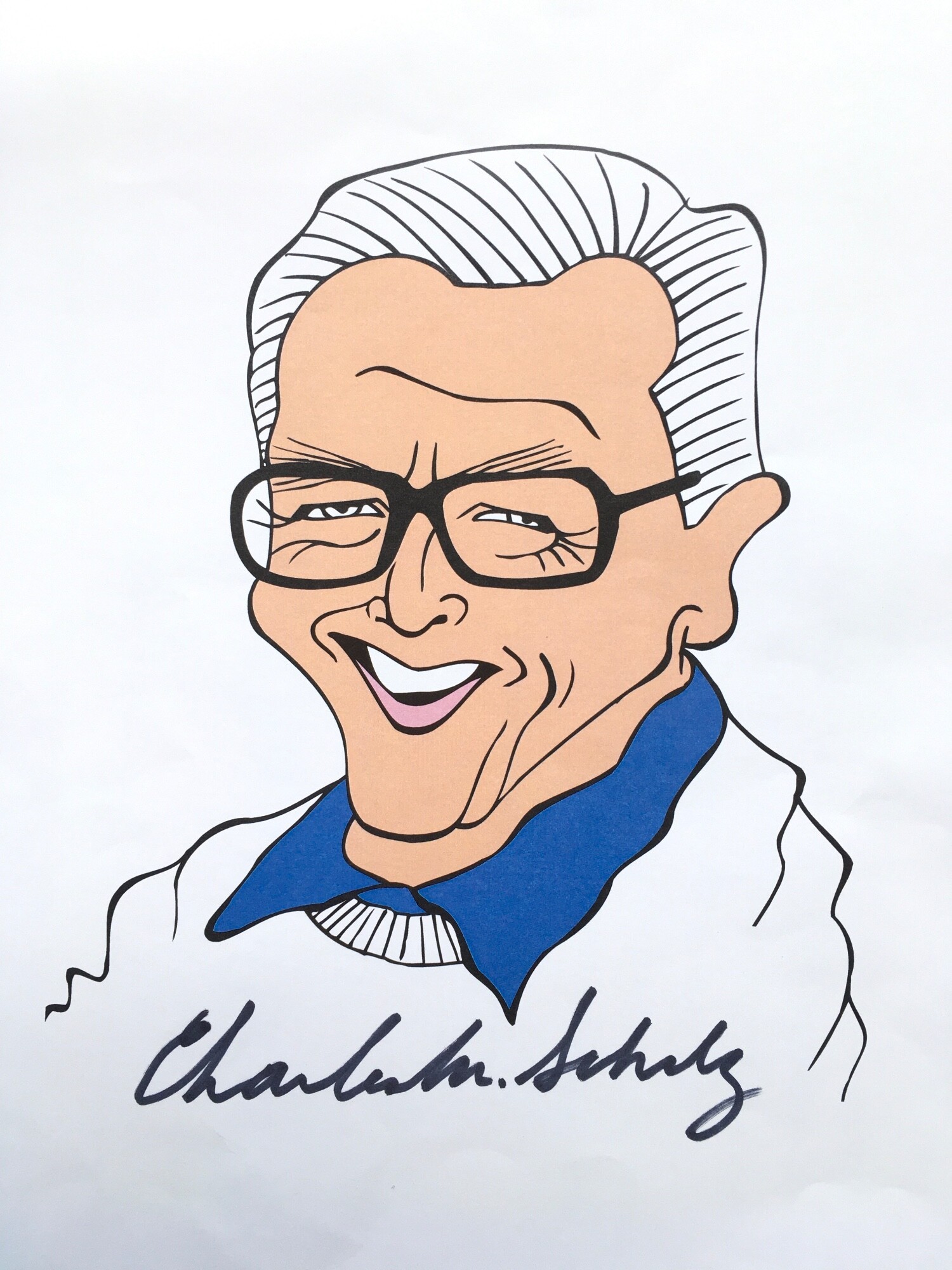 A self portrait print signed by Snoopy creator Charles M Schulz plus a Peanuts cartoon serigraph cel mounted and framed, approx 35.5cm x 28cm.