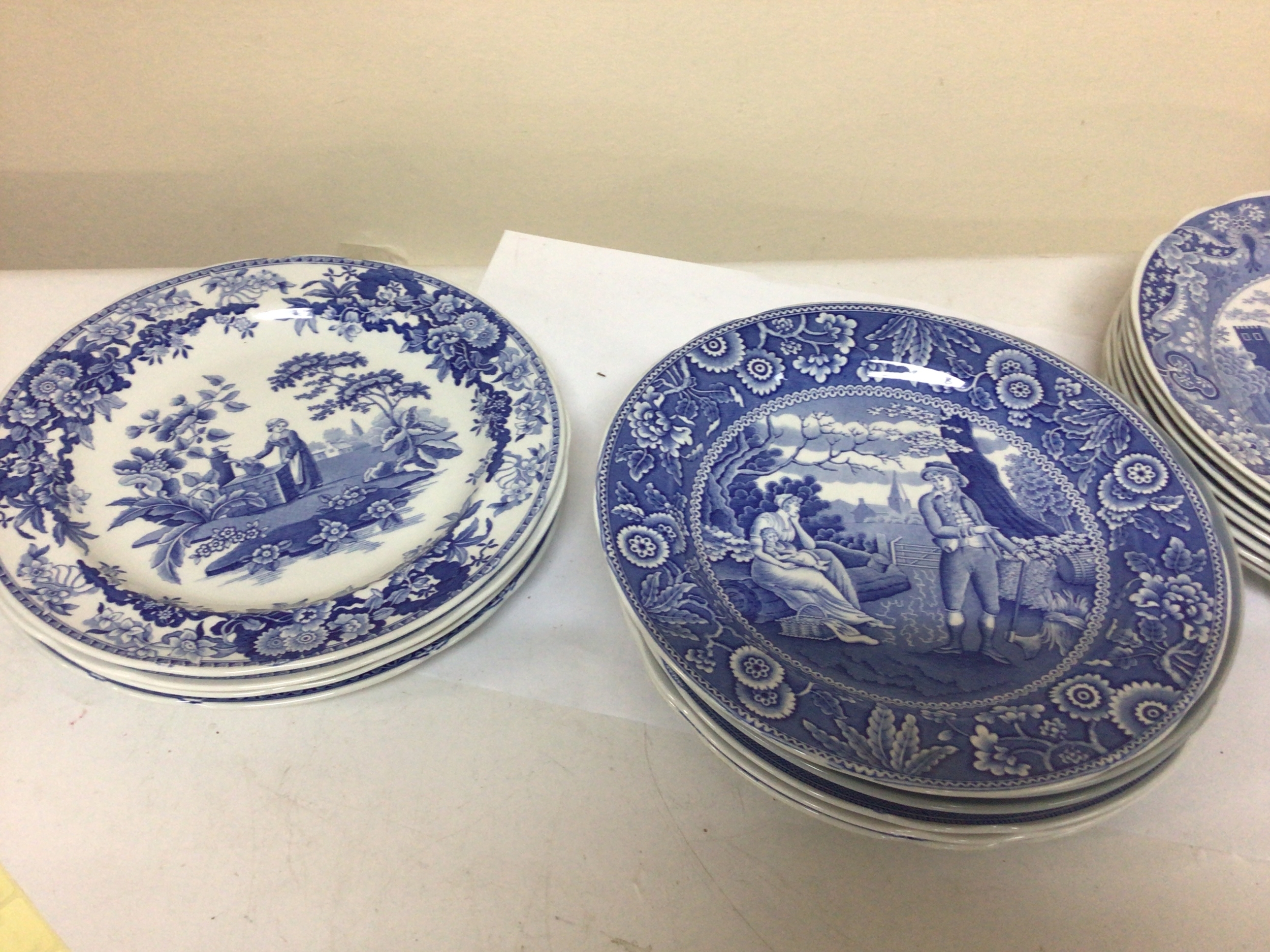 A box containing a collection of blue and white plates 20th century Spode. 