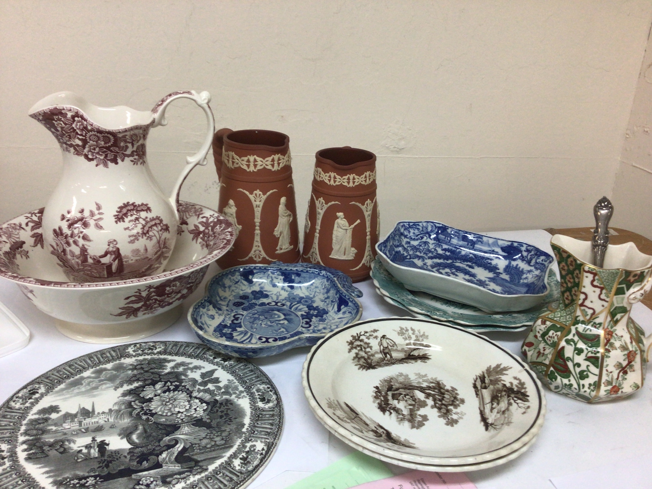 A collection of ceramics Victorian and later including a Spode jug and bowl Rural Scenes blue and white plates jugs and others. 
 
