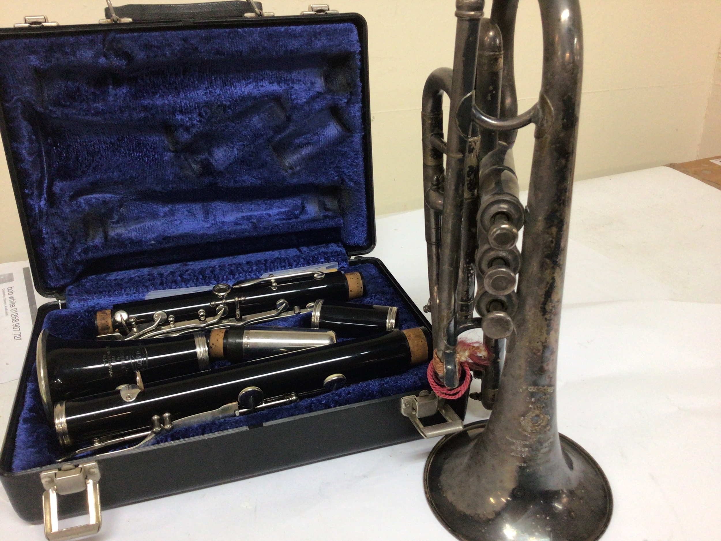 An American Clarenet possibly Bb model maker Bundy of America and a Vintage Cornet The Congress serial number 16678 London maker (2)