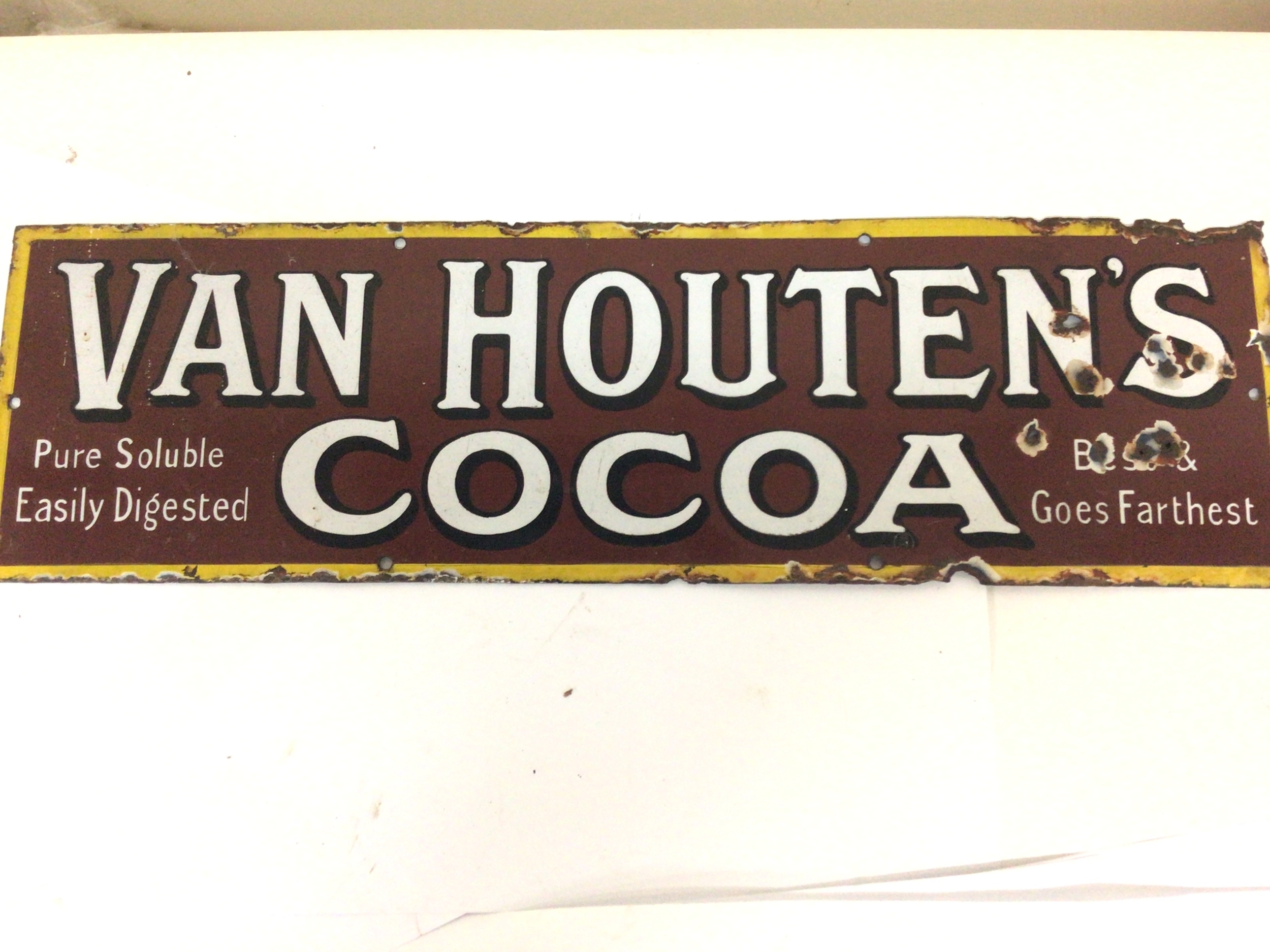 A Vintage enamel sign Van Houten's Cocoa 61x18cm