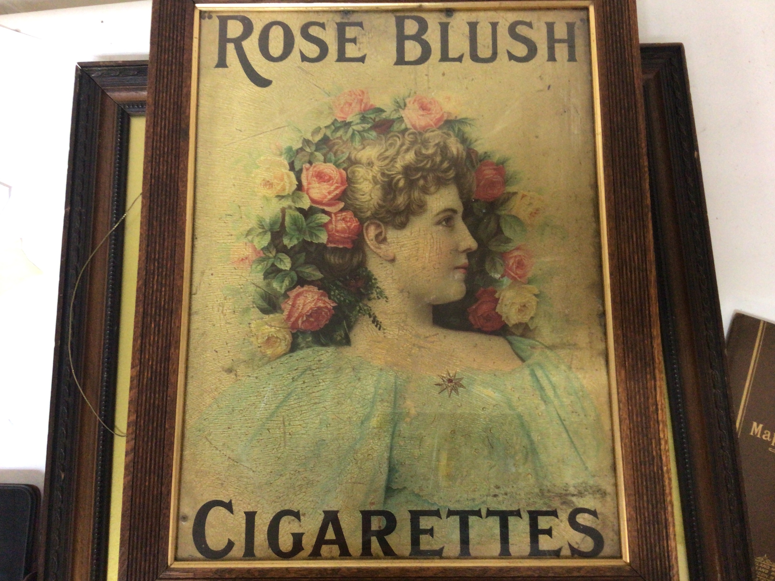   A Victorian advertising sign Rose Blush Cigarettes 