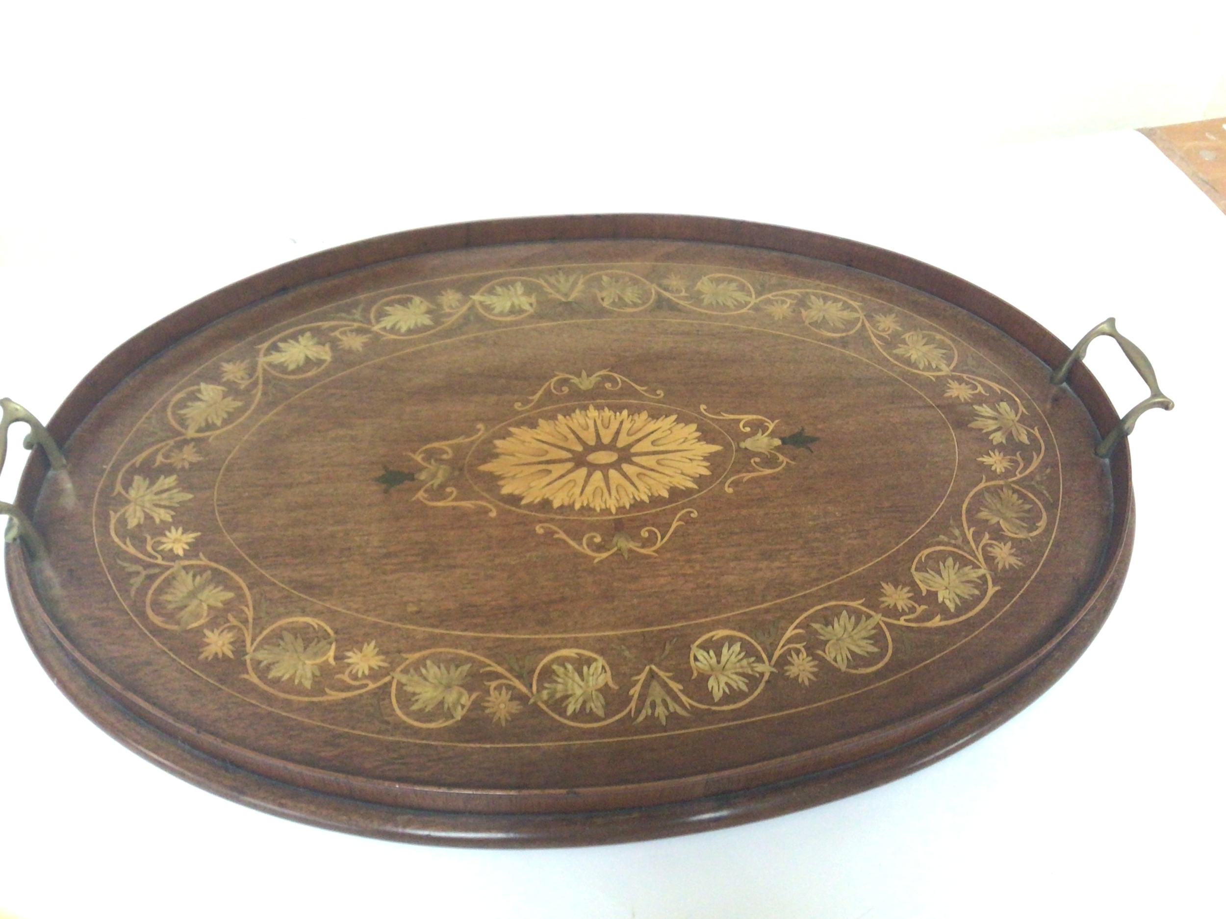 A quality Edwardian inlaid Mahogany oval tea tray inlaid with satinwood 64cm
