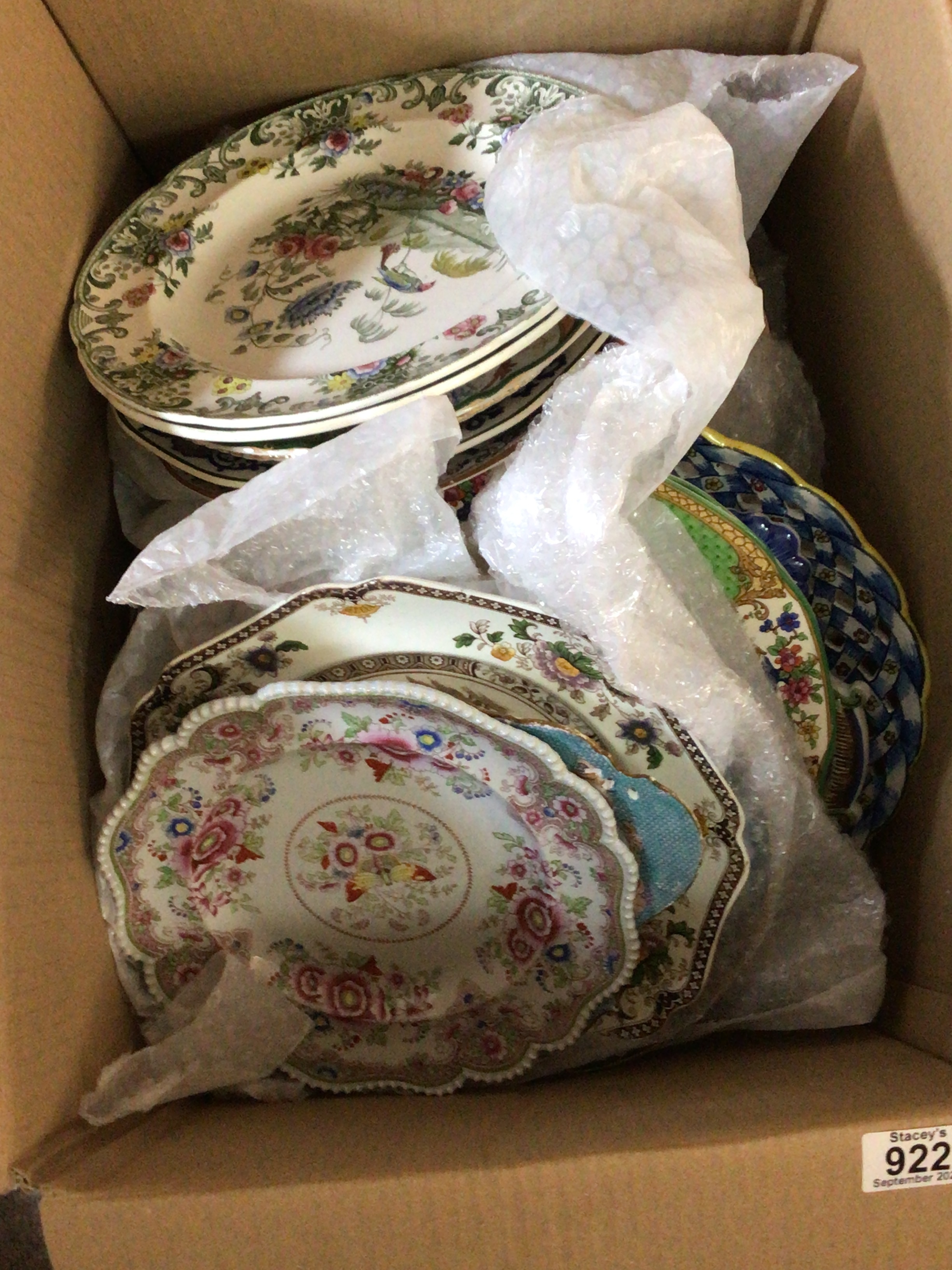  A box containing a collection of Victorian and later polychrome decorated plated including ironstone plates and many others 
