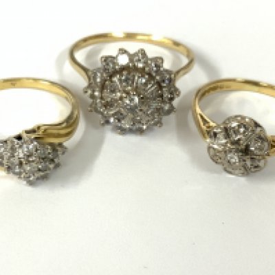 Three 18ct gold diamond cluster rings. Approx ring size M,R. Approx 11.2g. Postage category A