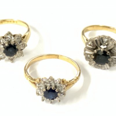 Three 18ct gold sapphire/diamond cluster rings. Approx ring size K,N,M. Approx 12.7g. Postage category A