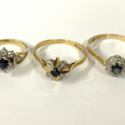 Three 18ct gold sapphires / diamond cluster rings. Approx ring size F, N, P. Approx 7.1g. Postage category A