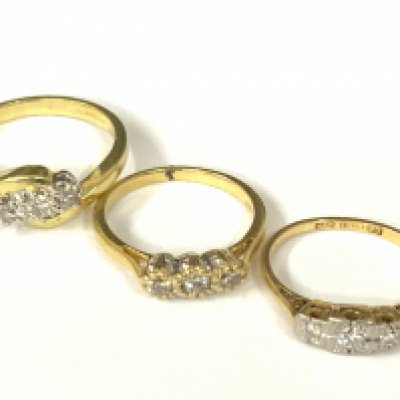 Three 18ct three stone diamond rings. Approx ring size J,N. Approx 8.8g. Postage category A