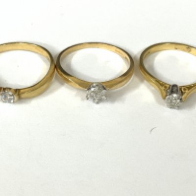 Three 18ct gold diamond solitaire rings. Approx ring size M,N.mapprox 6.5g. Postage category A
