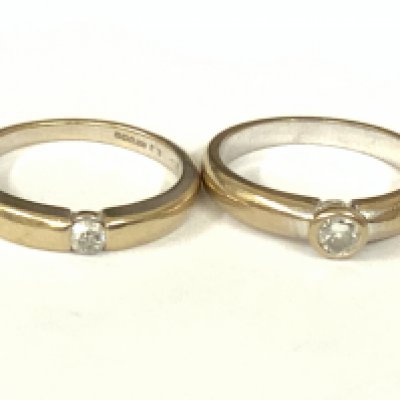 Two 18ct white gold diamond solitaire. Approx ring size N. Approx 7.8g. Postage category A