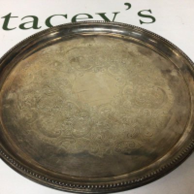 A Silverctray of circular shape Birmingham hallmarks with a scroll pattern and beaded edge weight 420g diameter 26cm