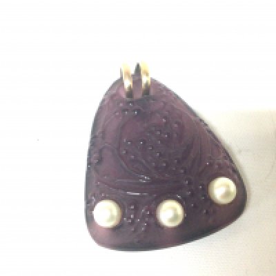 A Lalique glass pendent set with three pearls the reverse signed Lalique 5cmx3.8cm approximately.