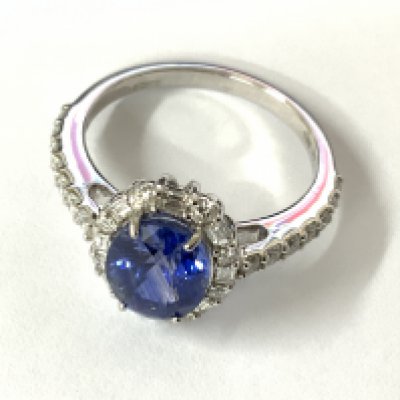 Certificated 18ct white gold oval sapphire and RBC and baguette cut diamond cluster ring with diamonds to the shoulders. Sapphire 2.50ct. Diamonds 0.60ct. Cert no. WGI9634154119. Approx N ring size. Postage category A.