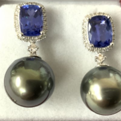Pair of 18ct white gold droplet earrings with suspended large grey pearls and cushion tanzanites and diamonds set to the bales, boxed. Tanzanites 3.24ct. R/C diamonds 0.27ct. Postage category A.