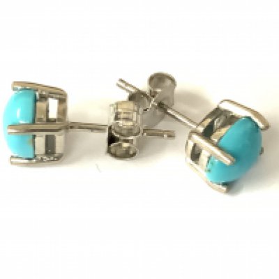 Pair of oval cabochon turquoise studs in silver. Postage category A