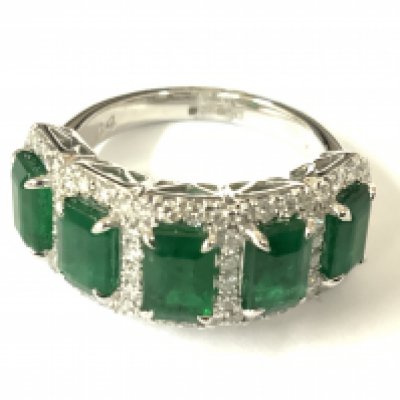 Platinum cluster ring set with 5 step cut emerald each surrounds by RBC diamonds. Emeralds 2.86ct. Diamonds 0.67ct. Approx ring size L. Postage category A