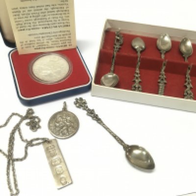 A silver ingot necklace pendant , 1977 sterling silver proof crown , silver st Christopher pendant and cased spoons . Postage category B