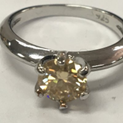 A 1ct Moissanite champagne solitaire ring with GRA report. Size N 1/2 in 925 silver ring.