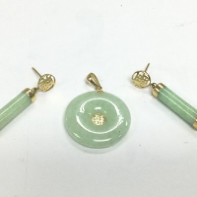 WITHDRAWN - A jade and gold pendant and earrings. Shipping category A.-