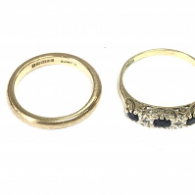 Two 9ct gold rings including a 9ct gold band. Size M and O. 4.80g Postage A