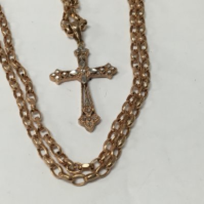 A 9 ct gold necklace with attached cross pendant.total weight 10 grams .