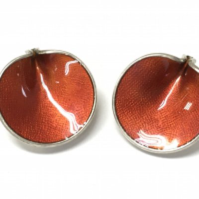 A pair of red silver earrings . Postage category A