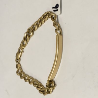 A 18 ct gold ID bracelet 32 grams .