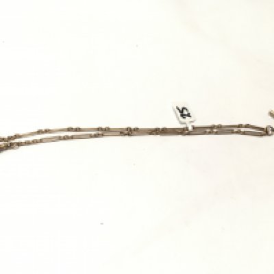 A 9ct gold long link Albert chain with a hanging t-bar , Approx weight 9 grams.