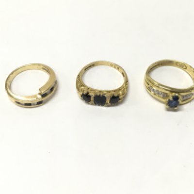 Three 18ct gold diamond and sapphire set rings.