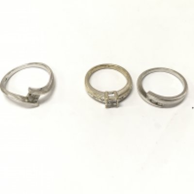 Three 18ct gold diamond set rings, sizes K,M,P1/2. Approx weight 8.6 grams.
