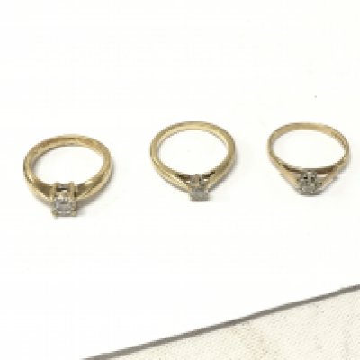 Three 9ct gold diamond solitaire rings. Size L,M, Approx weight 7.8 grams
