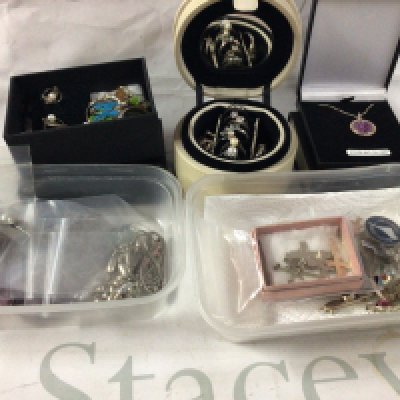 A large collection of costume jewellery, including some silver items.